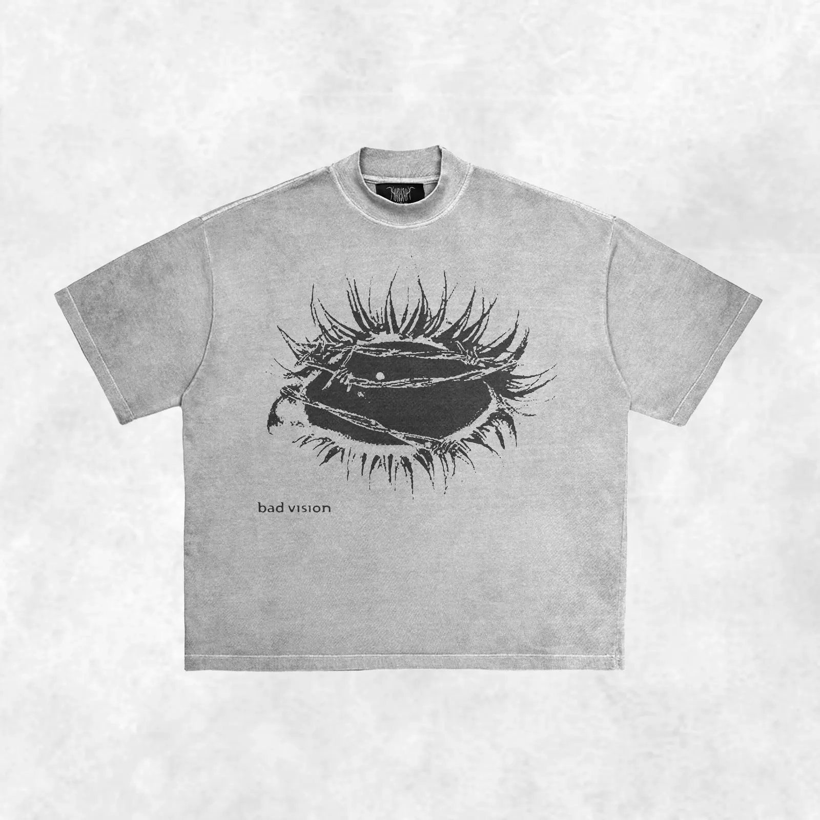 washed gray tee mockup with grunge stitched eye, bad vision text