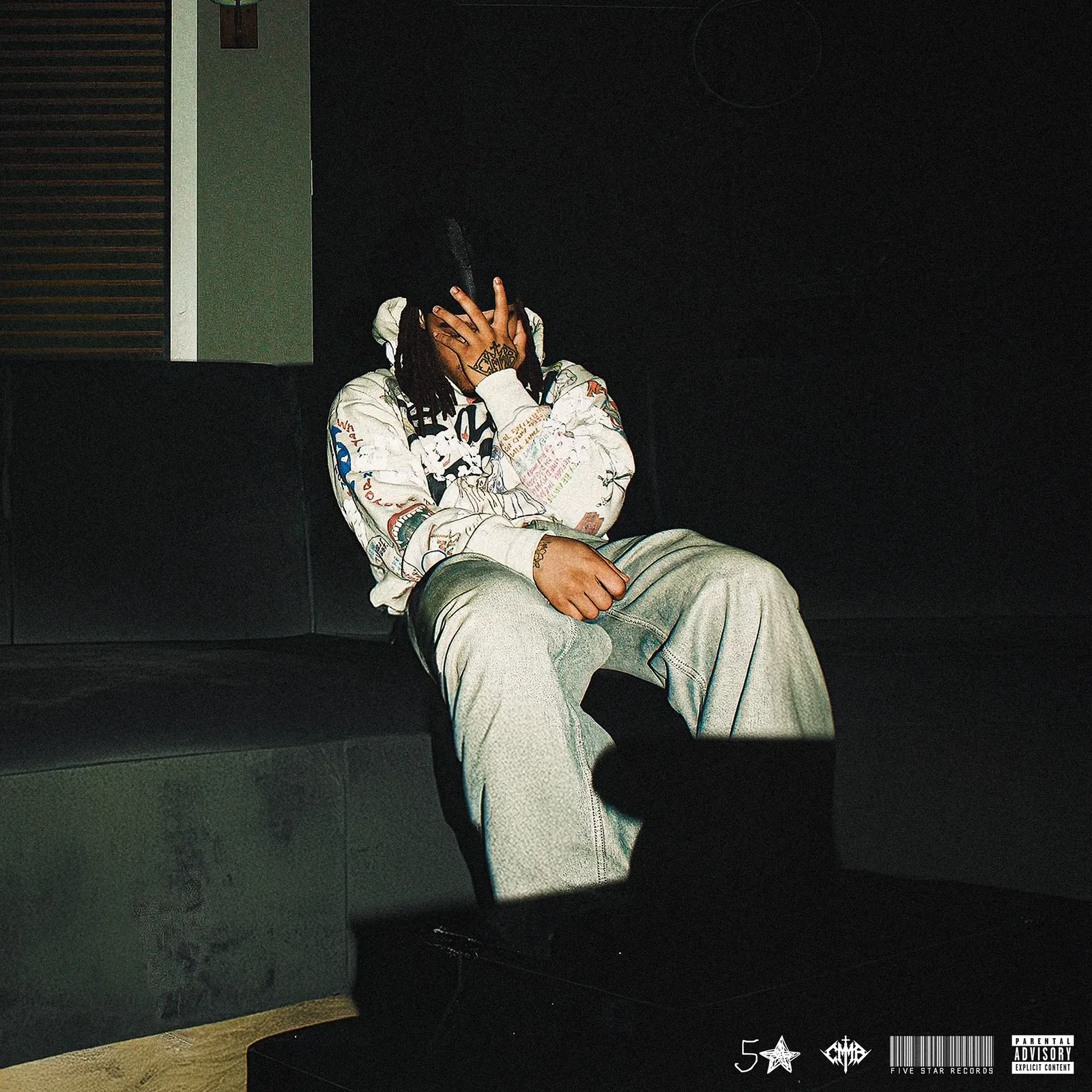 man hiding face on dark couch, Five Star Records album cover